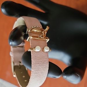 Pink Suede Buckle Bracelet Accented with Gold tone Charms  A Must look